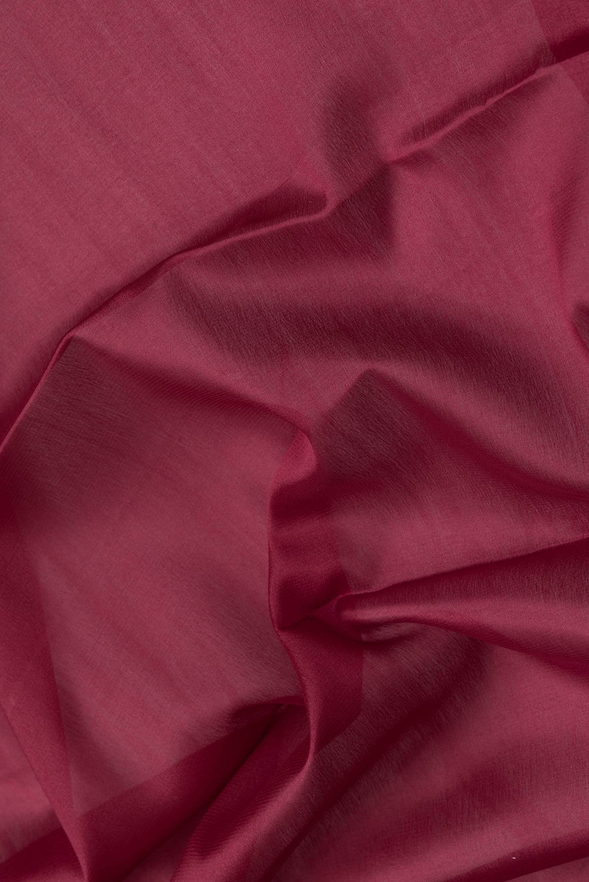 Close up of Maroon Dual Tone Mysore Silk Saree with Plain Body and Zari Border.  displaying folds