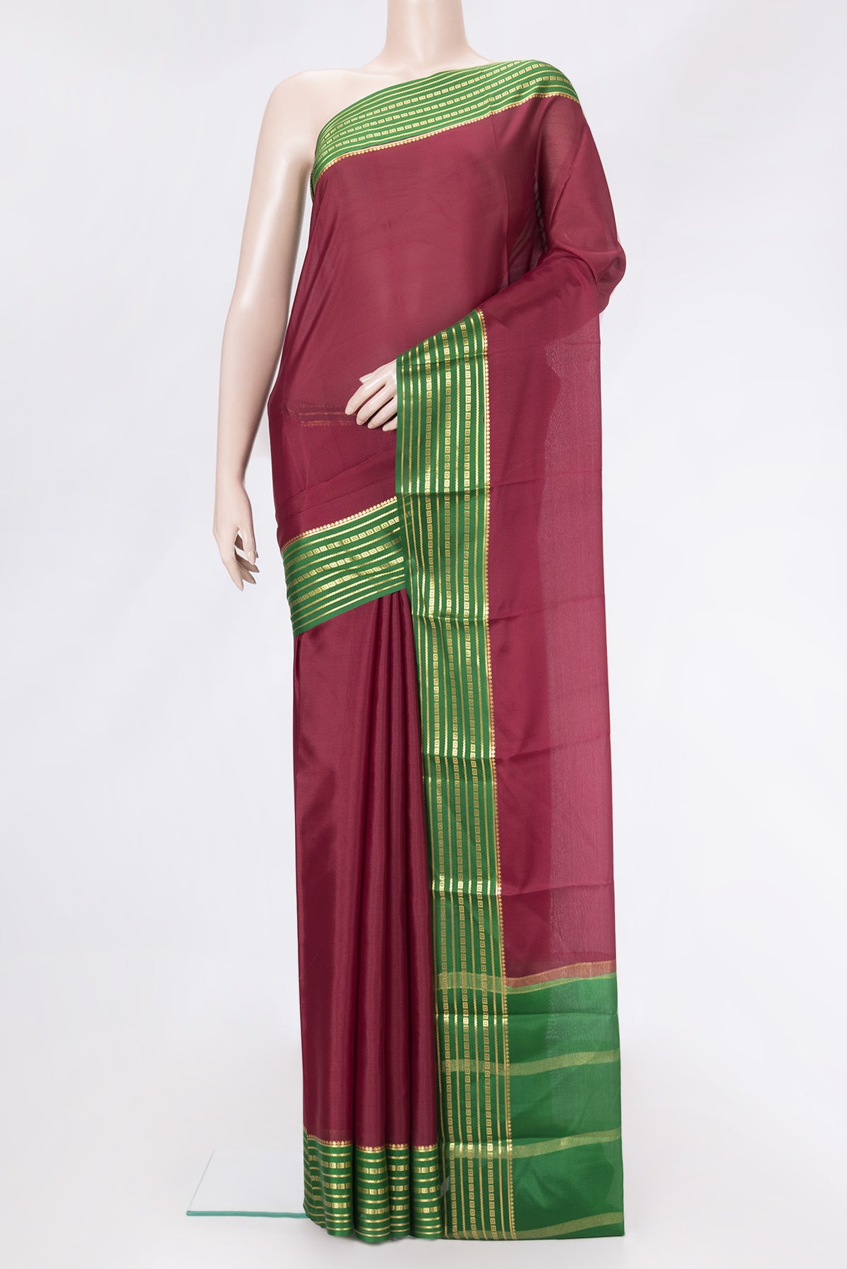 Maroon Dual Tone Mysore Silk Saree with Plain Body and Zari Border.  displayed on a mannequin