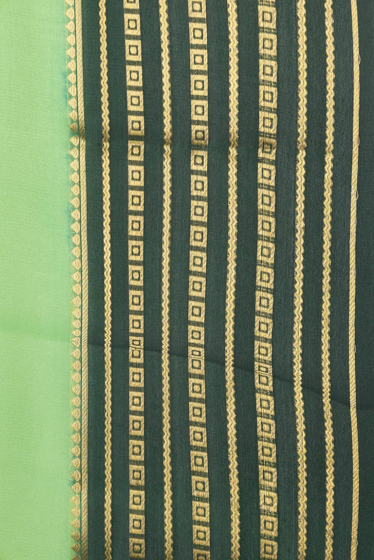 Border image of Parrot Green Dual Tone Mysore Silk Saree with Plain Body and Zari Border. 