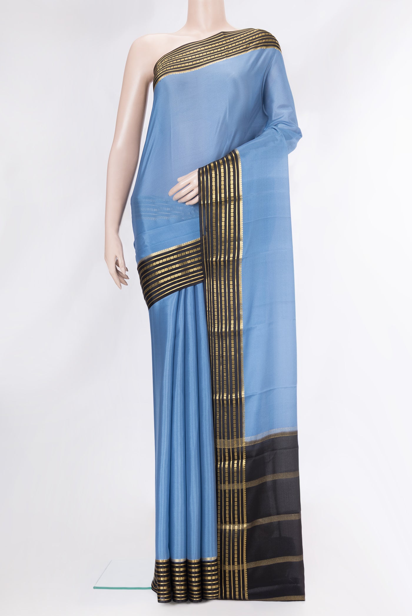 Sky Blue Dual Tone Mysore Crepe Saree with Plain Body and Zari Border.  displayed on a mannequin