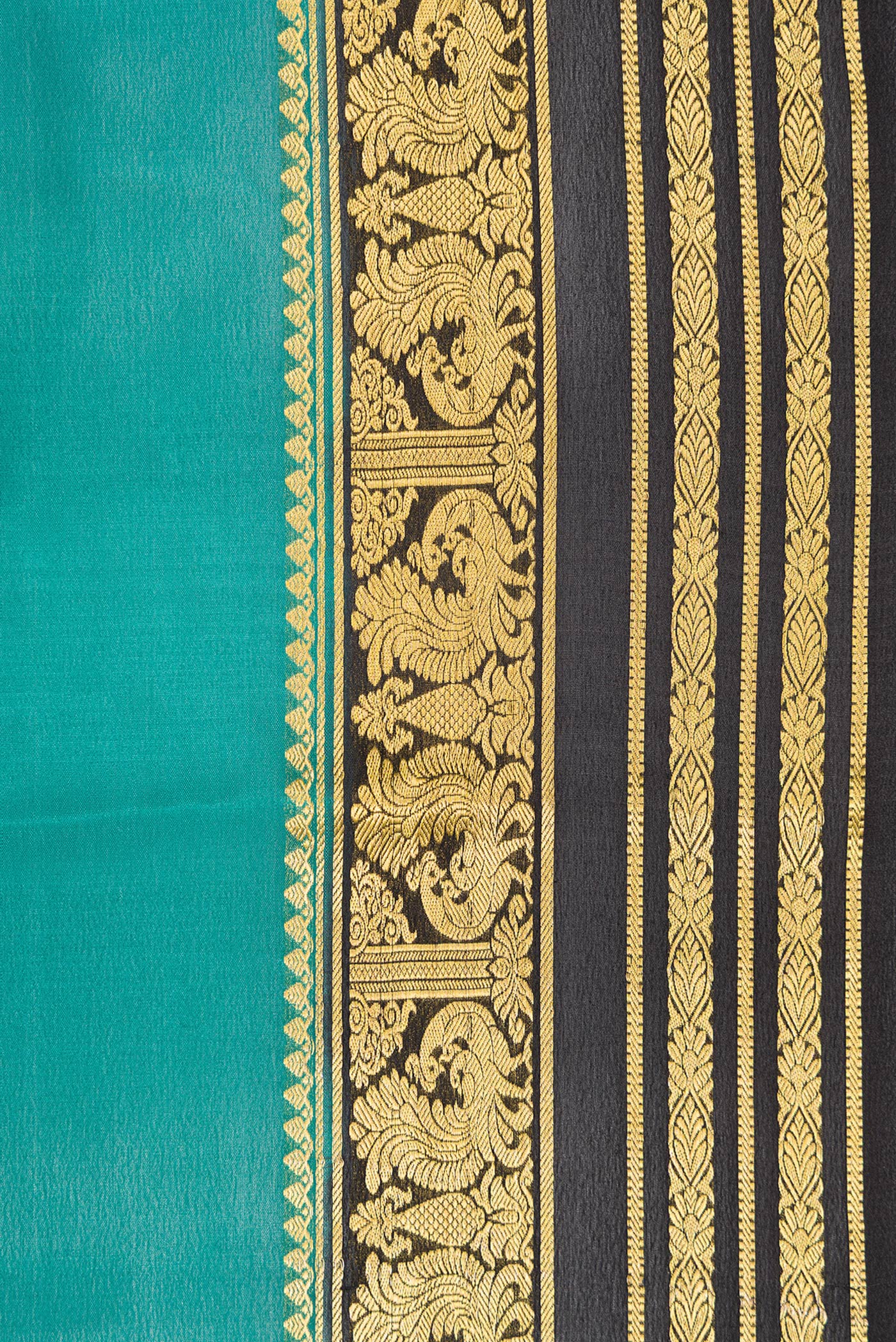 Border image of Green Dual Tone Mysore Silk Saree with Plain Body and Zari Border. 