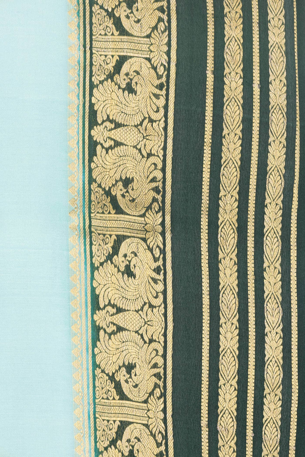Border image of Light Blue Dual Tone Mysore Silk Saree with Plain Body and Zari Border. 