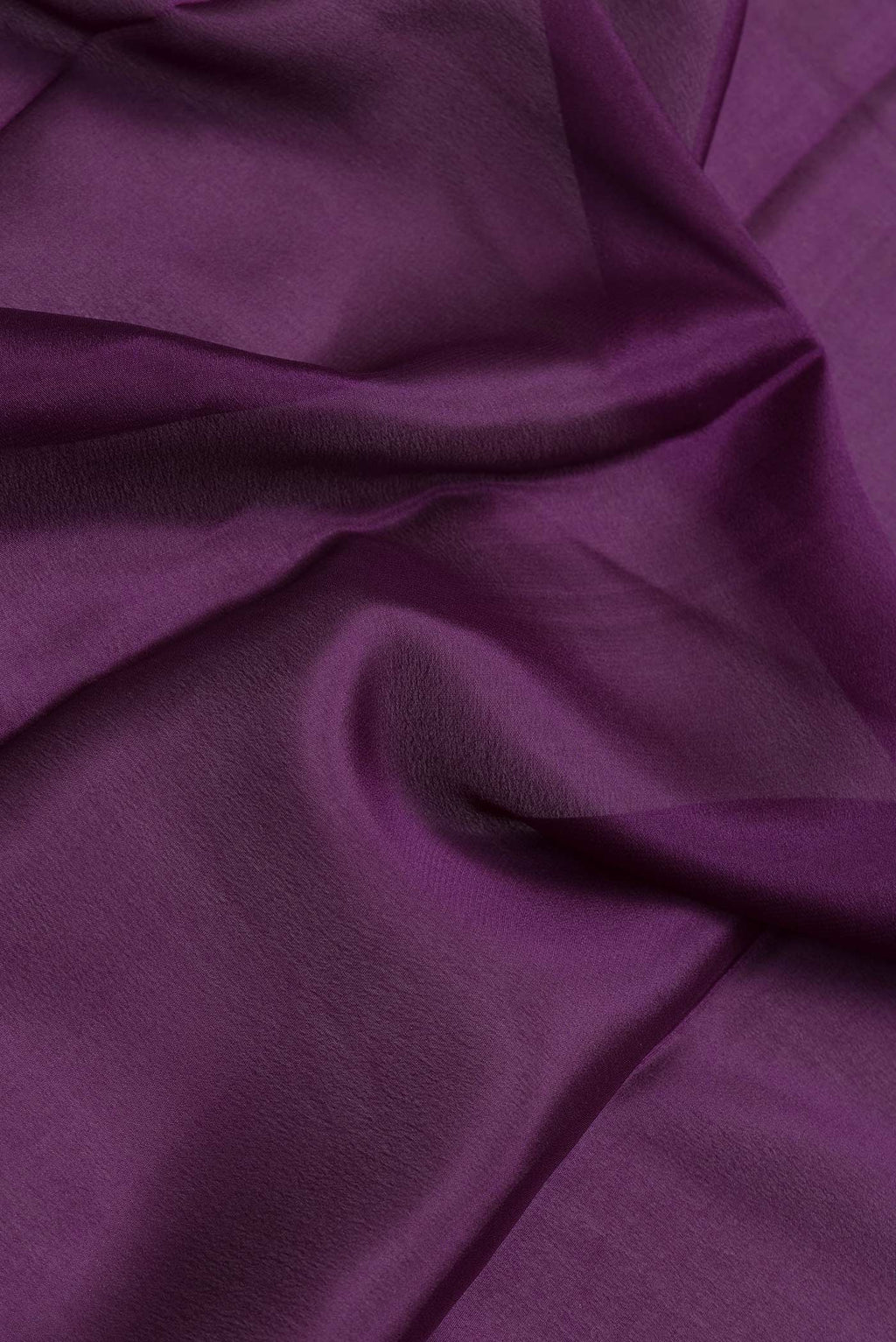 Close up of Purple Dual Tone Mysore Silk Saree with Plain Body and Zari Border.  displaying folds
