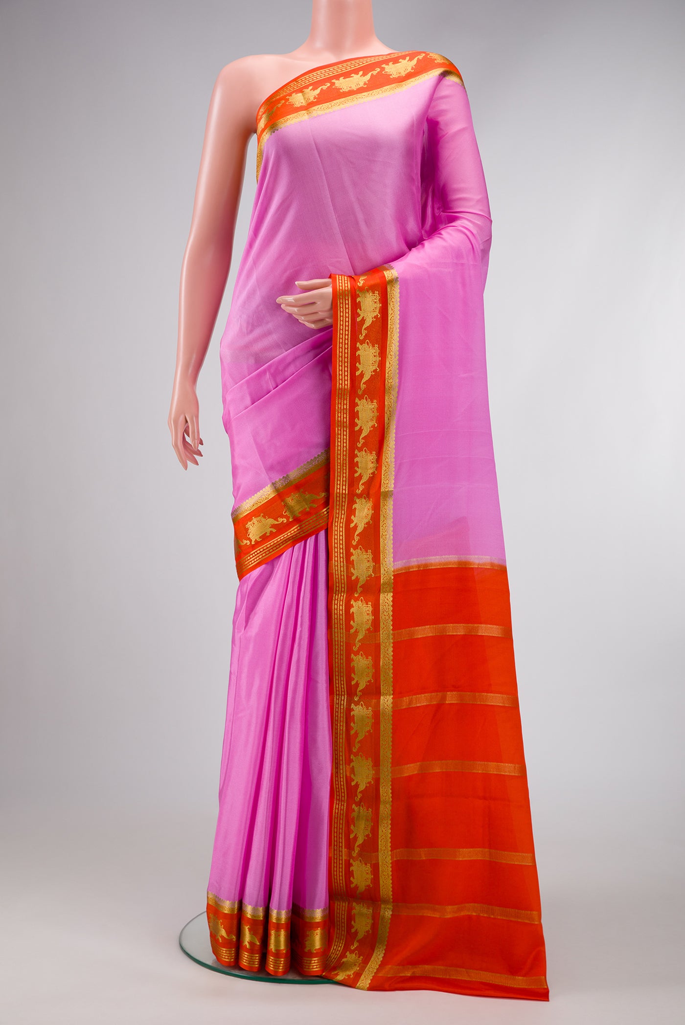 Pink Dual Tone Mysore Silk Saree with Plain Body and Fancy Border.  displayed on a mannequin