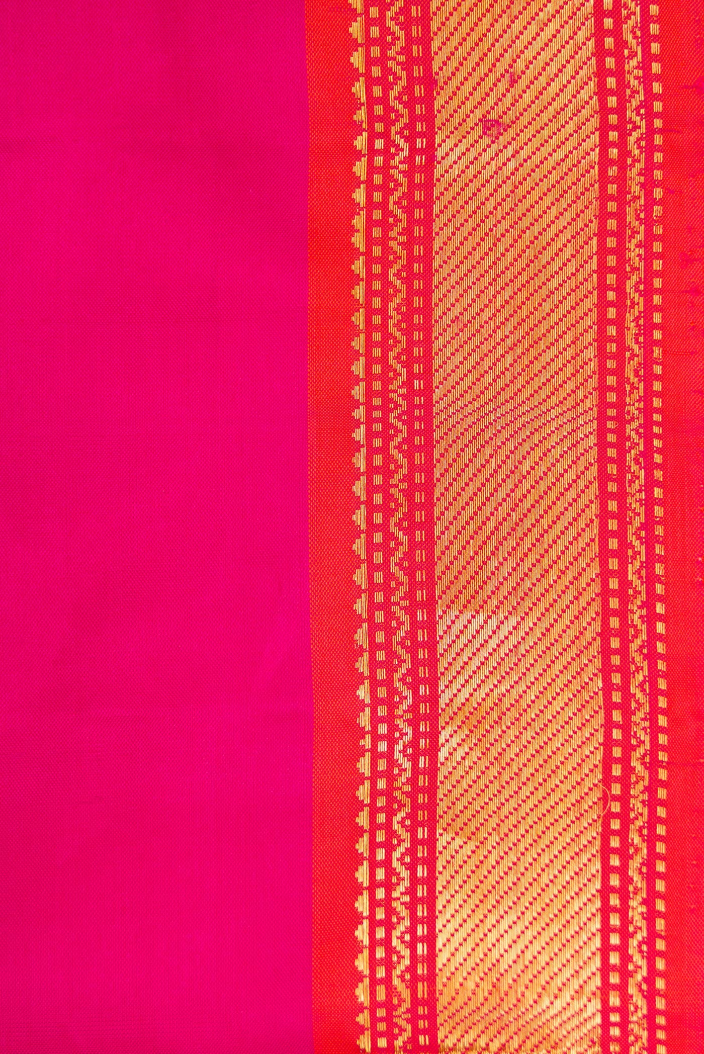 Border image of Magenta Dual Tone Kanjivaram Silk Saree with Plain Body and Zari Border. 
