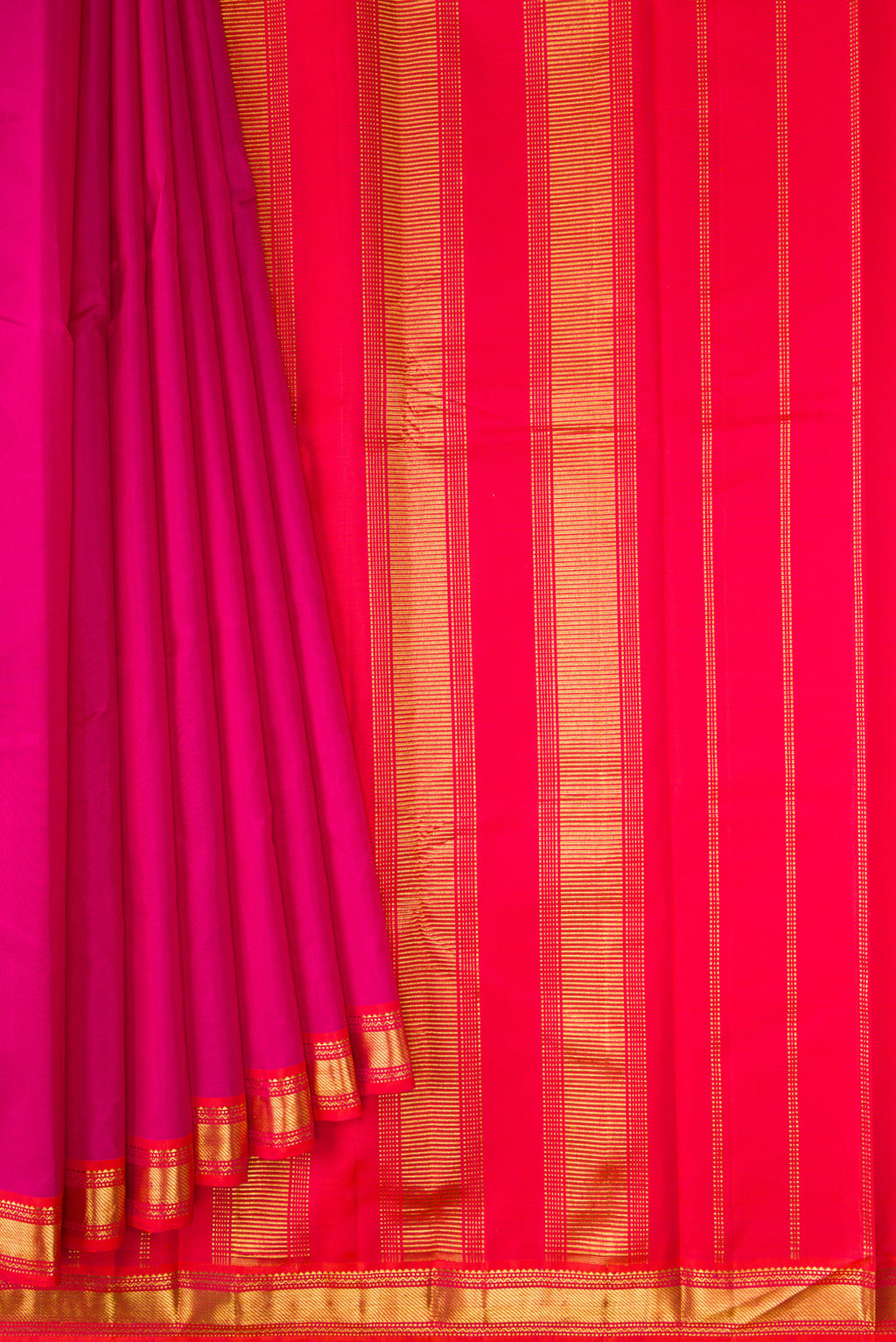 Pleats and pallu of Magenta Dual Tone Kanjivaram Silk Saree with Plain Body and Zari Border. 