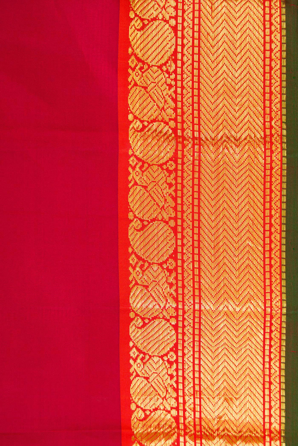Border image of Maroon Dual Tone Kanchipuram Silk Saree with Plain Body and Zari Border. 