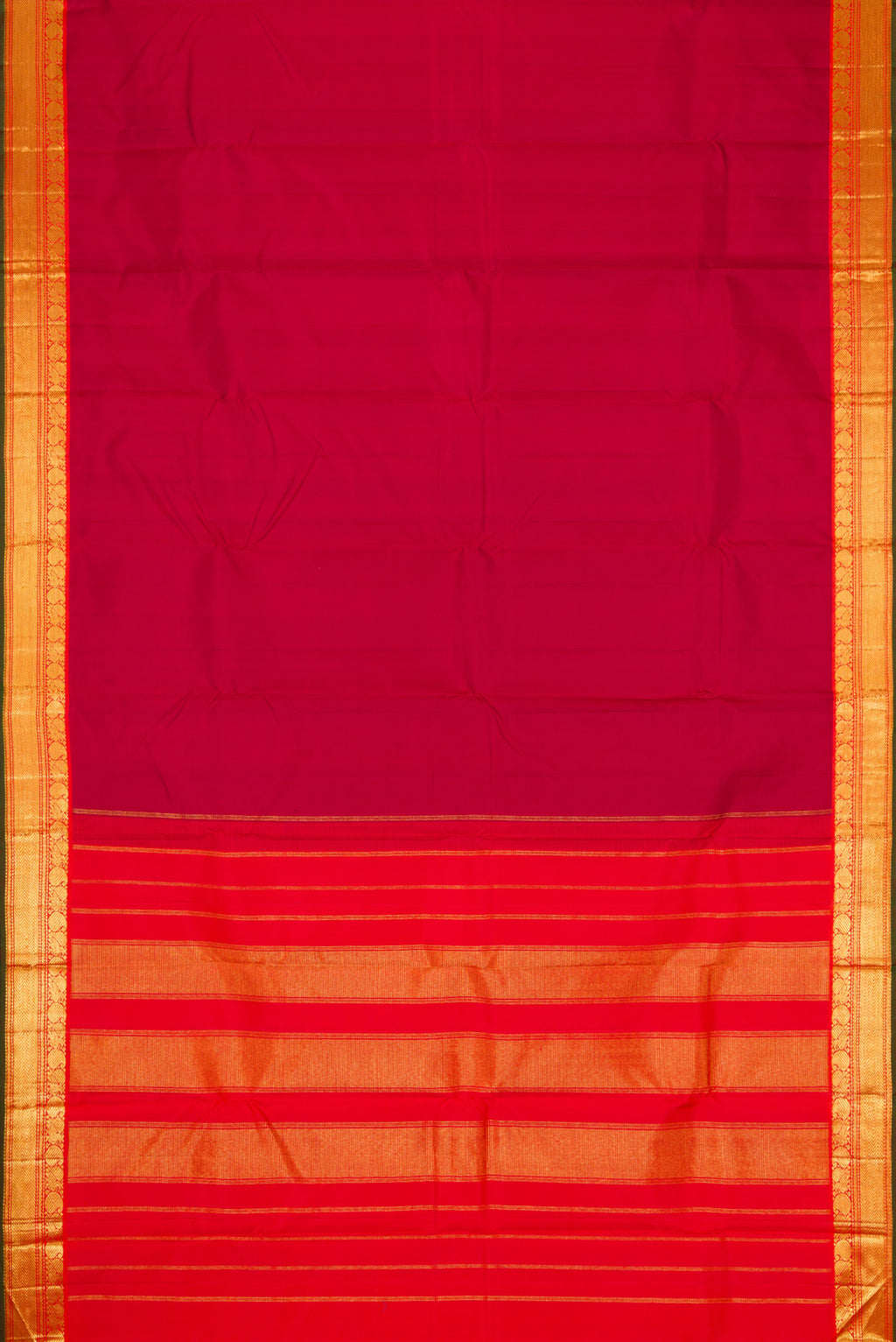 Flat view of Maroon Dual Tone Kanchipuram Silk Saree with Plain Body and Zari Border. 