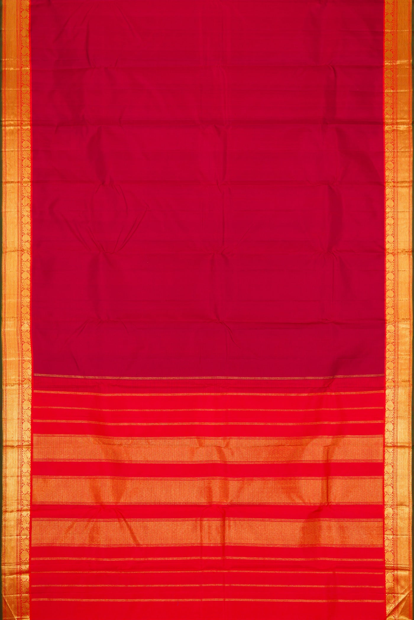 Flat view of Maroon Dual Tone Kanchipuram Silk Saree with Plain Body and Zari Border. 