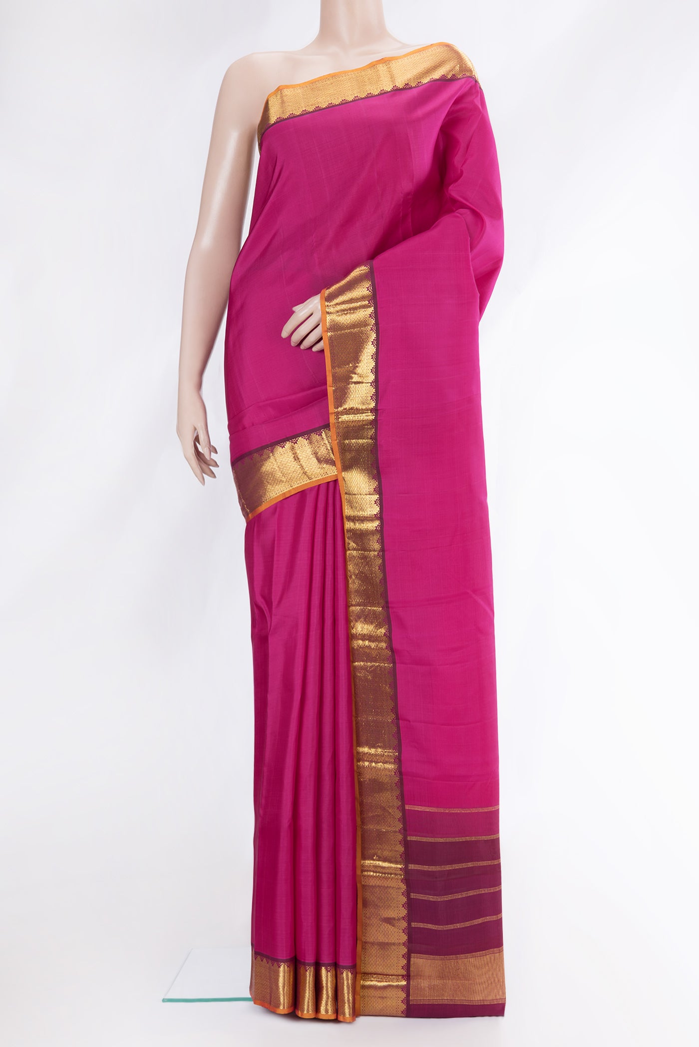 Pink Dual Tone Kanchipuram Silk Saree with Plain Body and Zari Border.  displayed on a mannequin
