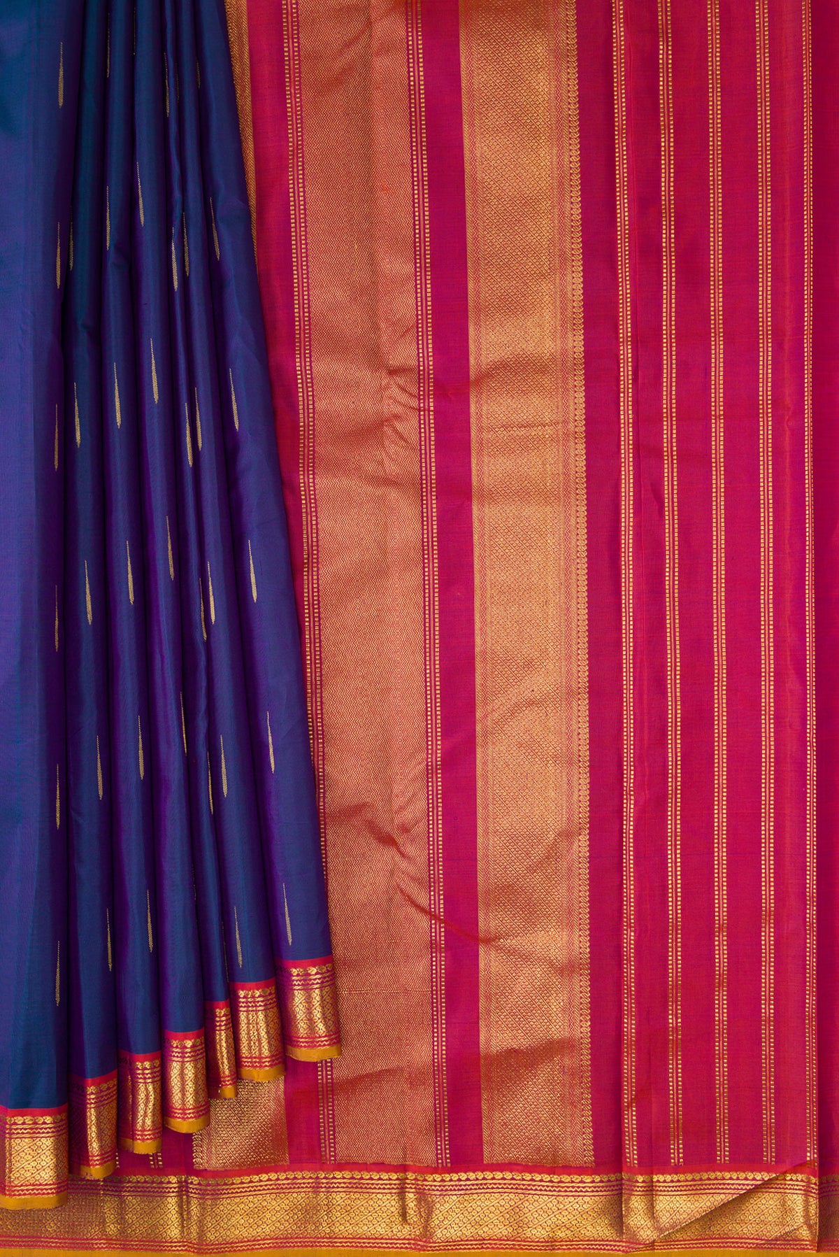 Pleats and pallu of Peacock Blue Dual Tone Kanchipuram Silk Saree with Zari Butta on the body and Zari Border. 
