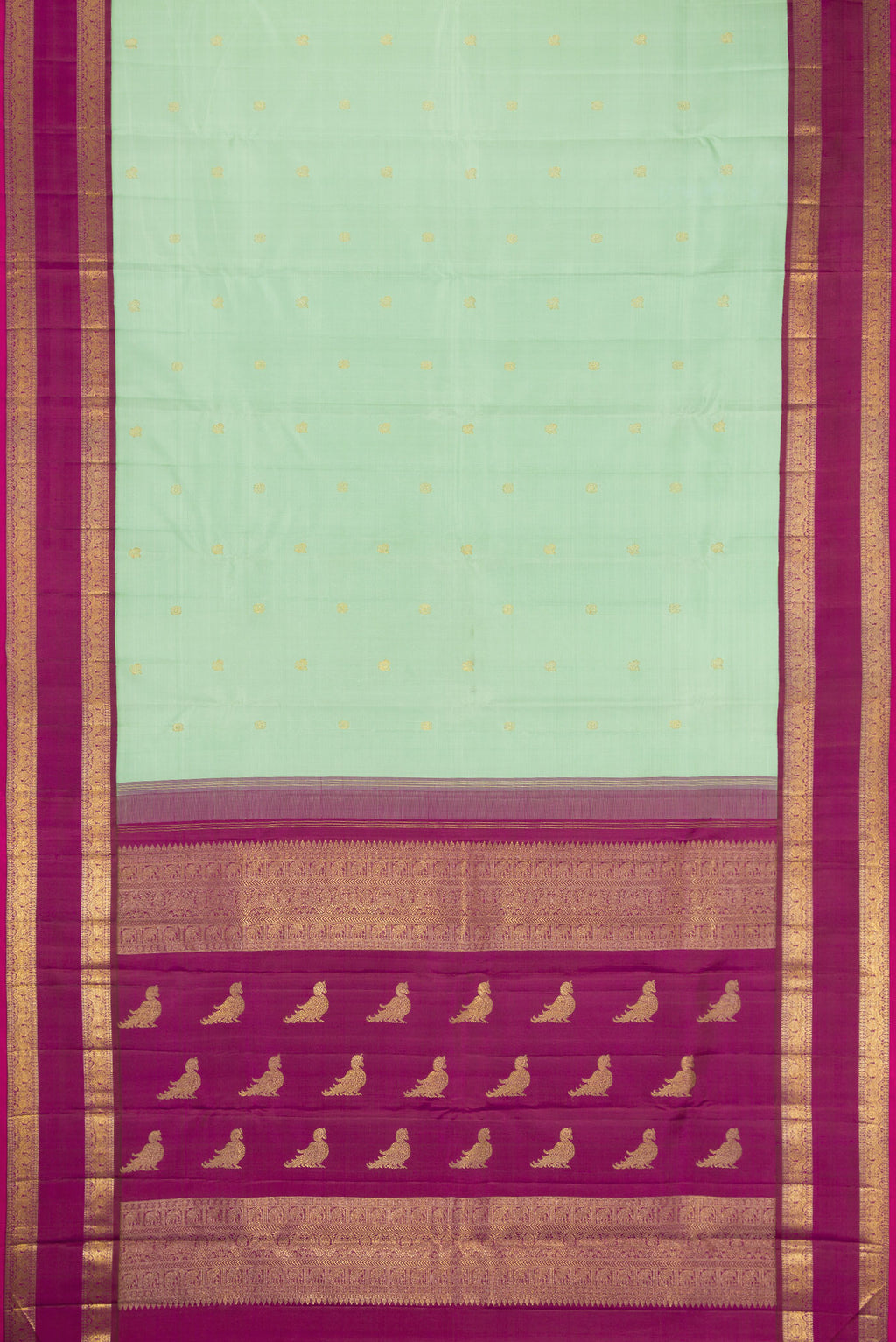 Flat view of Pure Silk Pure Zari Light Green Dual Tone Kanjivaram Saree with Zari Butta on the body and Zari Border. 