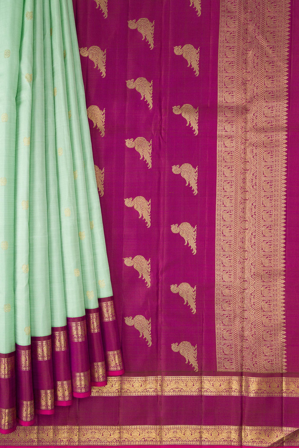Pleats and pallu of Pure Silk Pure Zari Light Green Dual Tone Kanjivaram Saree with Zari Butta on the body and Zari Border. 