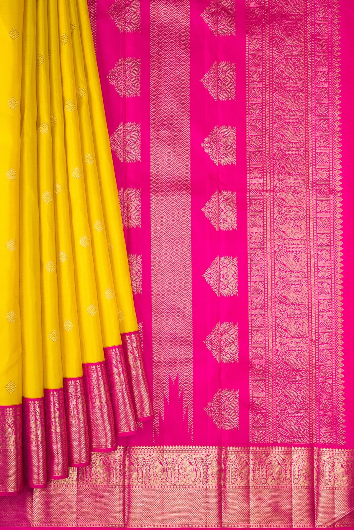 Pleats and pallu of Yellow Dual Tone Kanjivaram Silk Saree with Zari Butta on the body and Zari Border. 