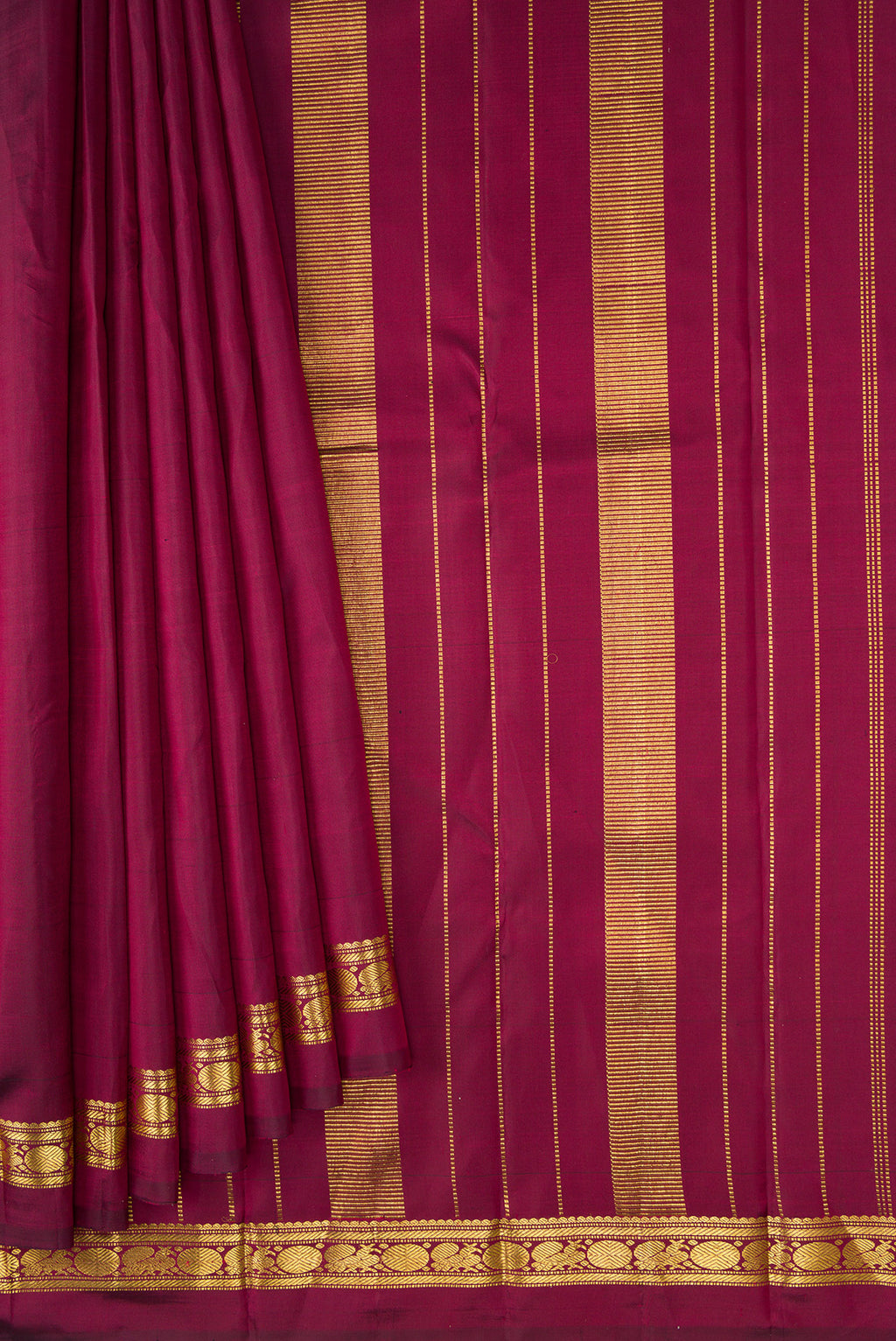 Pleats and pallu of Pure Silk Pure Zari Maroon Dual Tone Kanjivaram Saree with Plain Body and Zari Border. 
