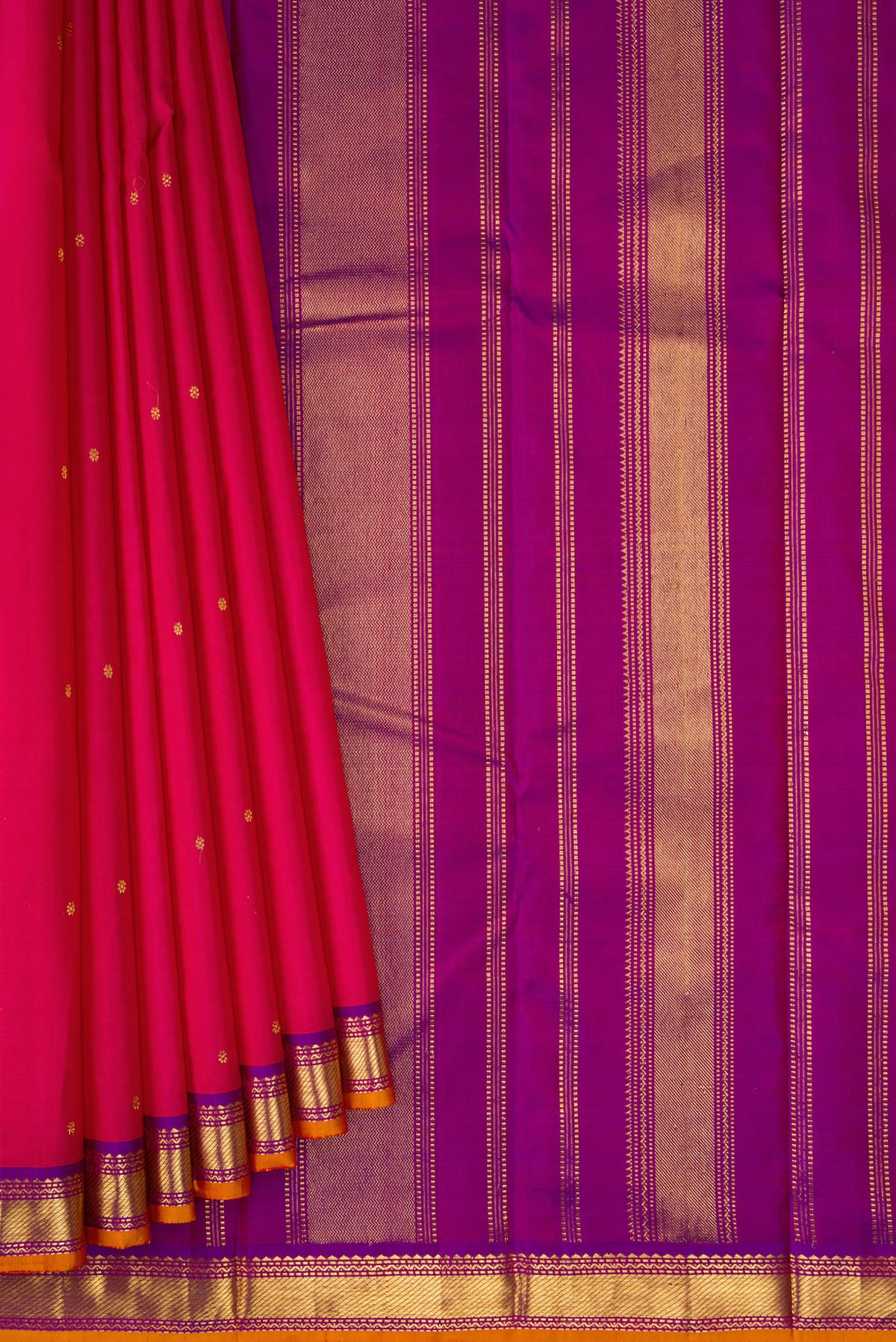 Pleats and pallu of Dark Pink Dual Tone Kanchipuram Silk Saree with Zari Butta on the body and Zari Border. 