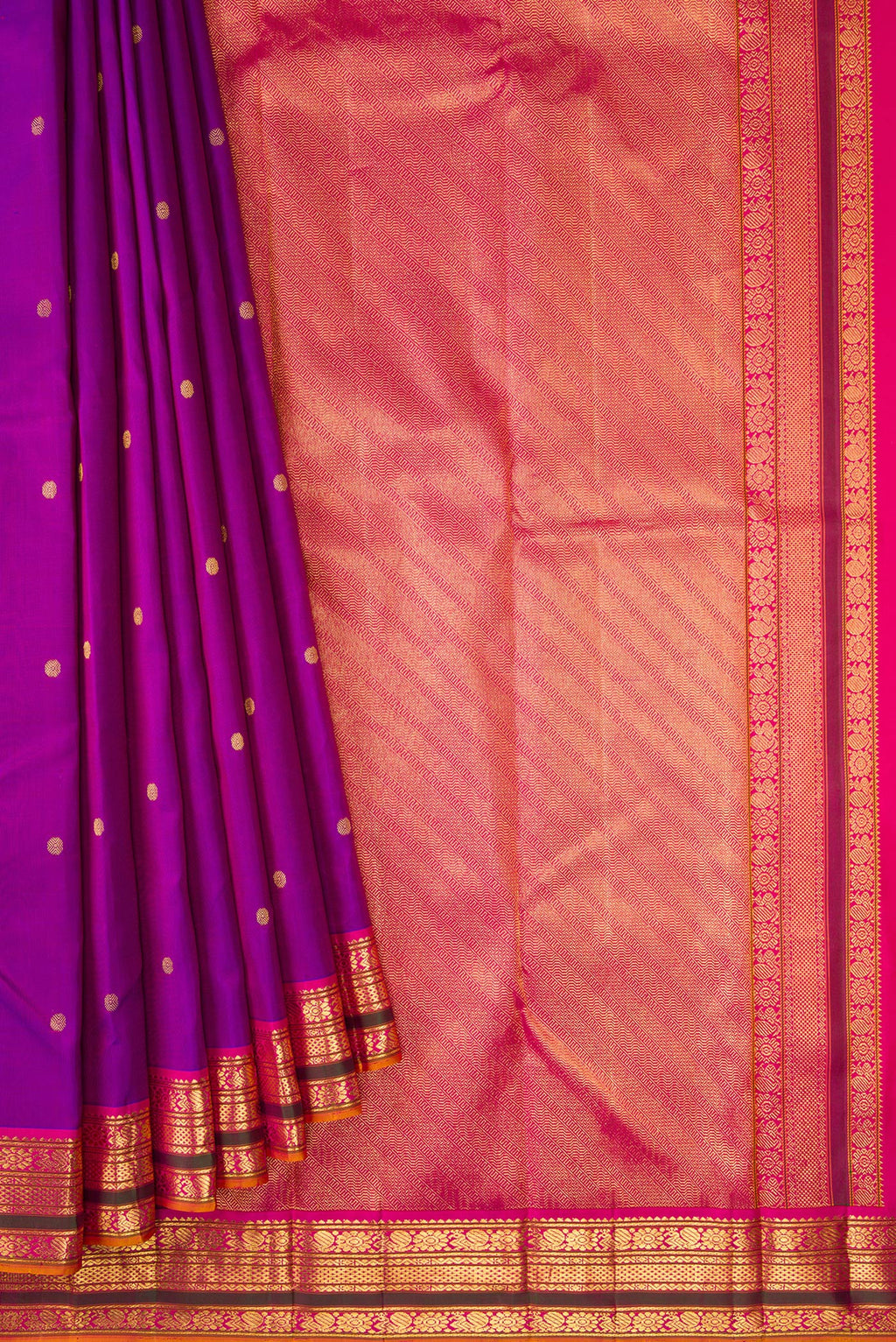 Pleats and pallu of Purple Dual Tone Kanjivaram Silk Saree with Zari Butta on the body and Zari Border. 