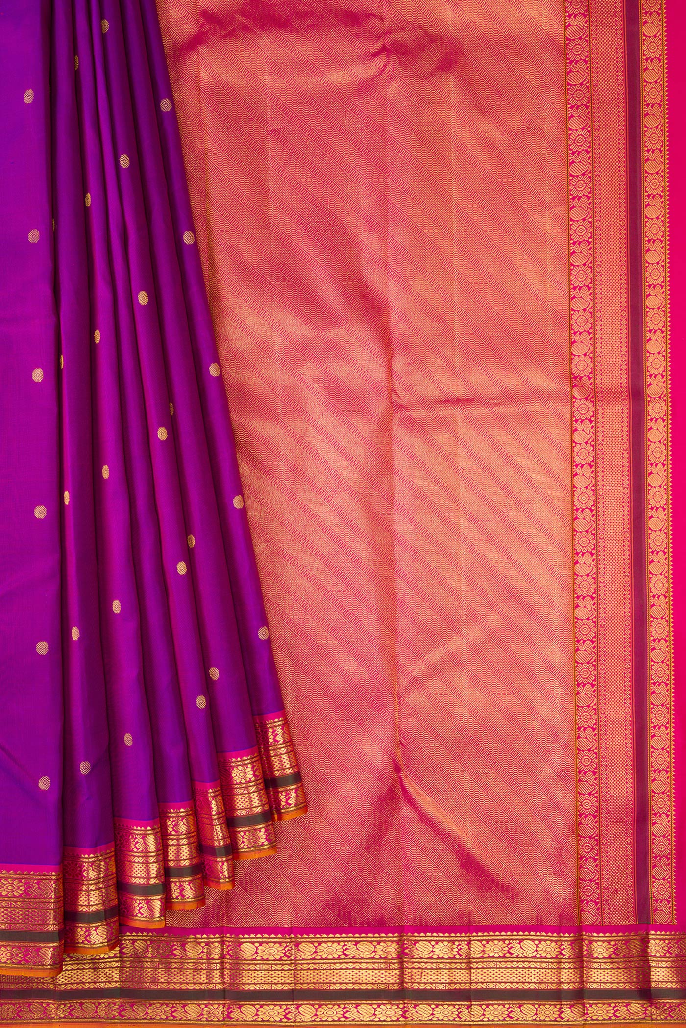 Pleats and pallu of Purple Dual Tone Kanjivaram Silk Saree with Zari Butta on the body and Zari Border. 