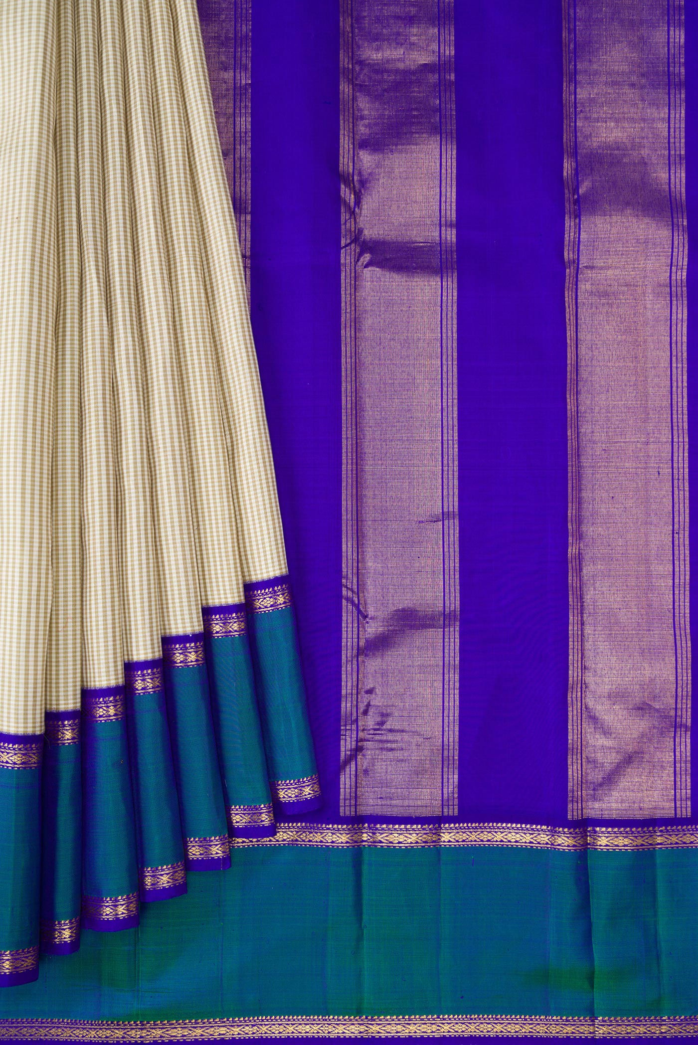 Pleats and pallu of Off White Dual Tone Kanjivaram Silk Saree with Checked design on the body and Zari Border. 
