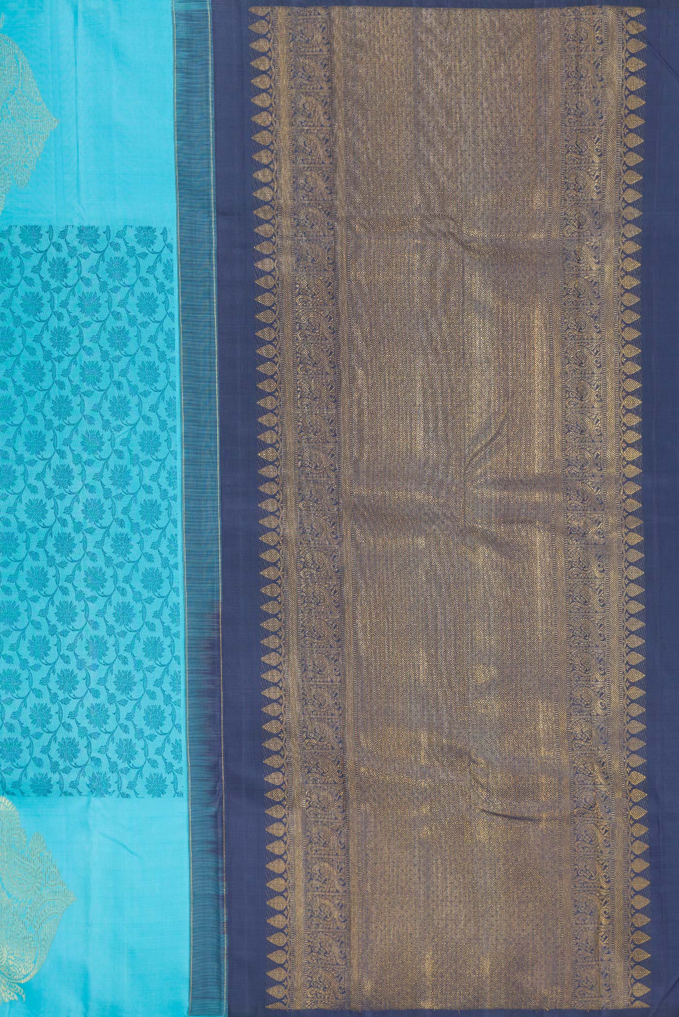 Close up image of the pallu of Sky Blue Dual Tone Kanjivaram Silk Saree with Zari Butta on the body and Fancy Border. 