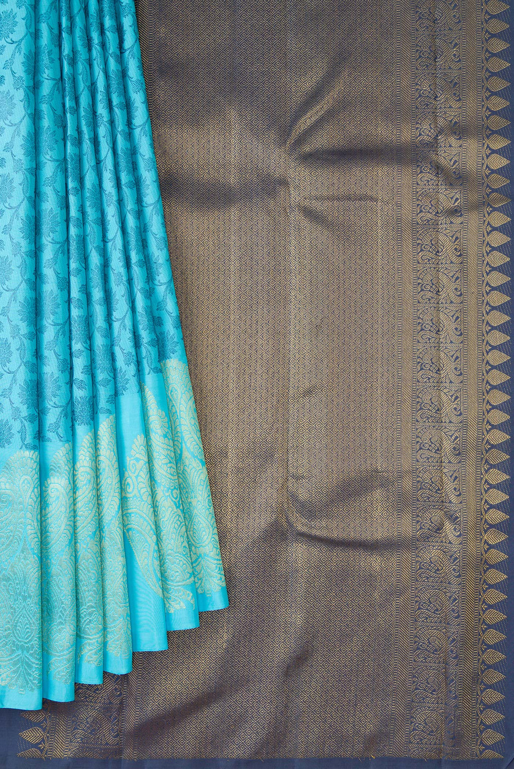 Pleats and pallu of Sky Blue Dual Tone Kanjivaram Silk Saree with Zari Butta on the body and Fancy Border. 