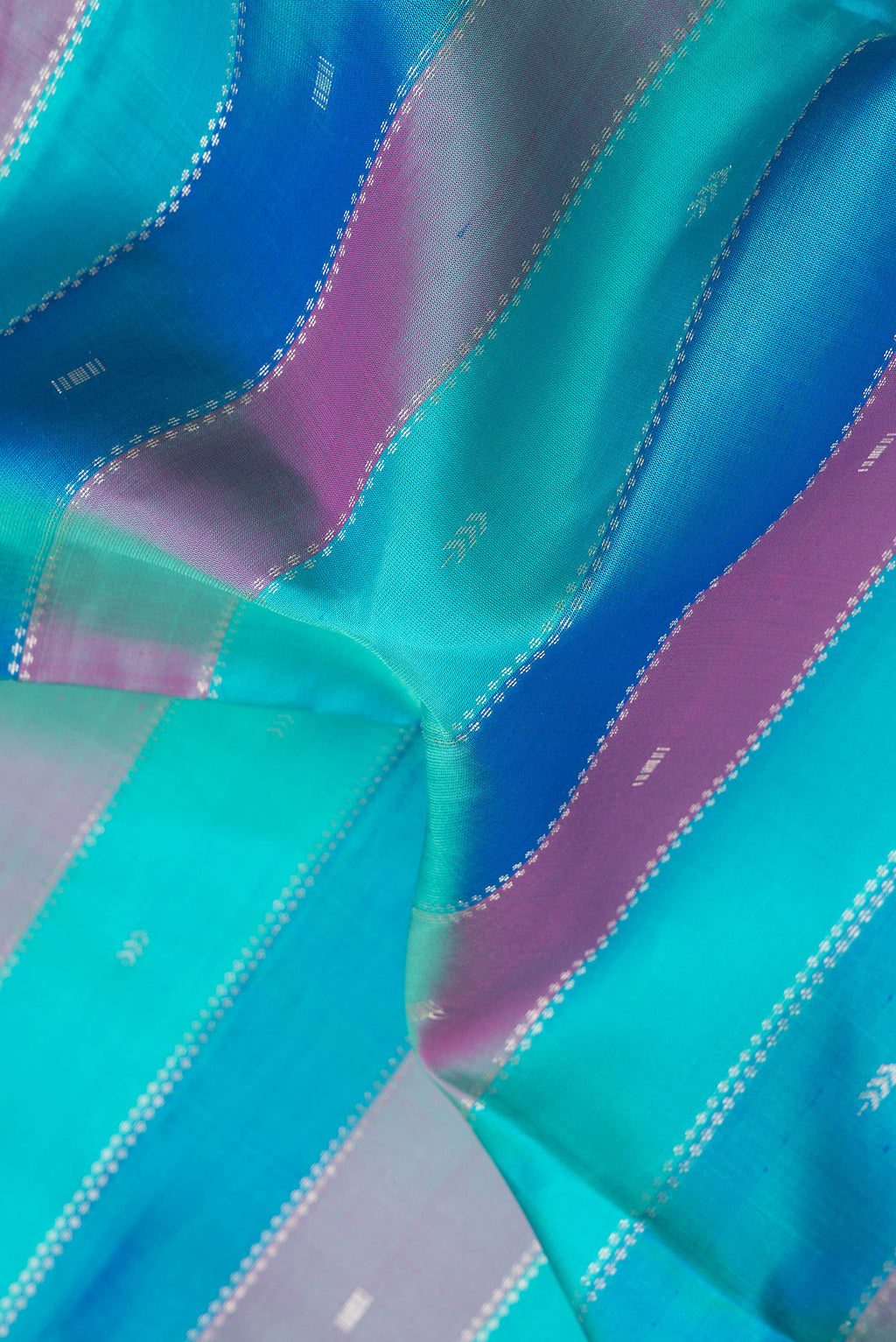Close up of Multi Color Soft Silk Saree with Stripes on the body and Without Border.  displaying folds