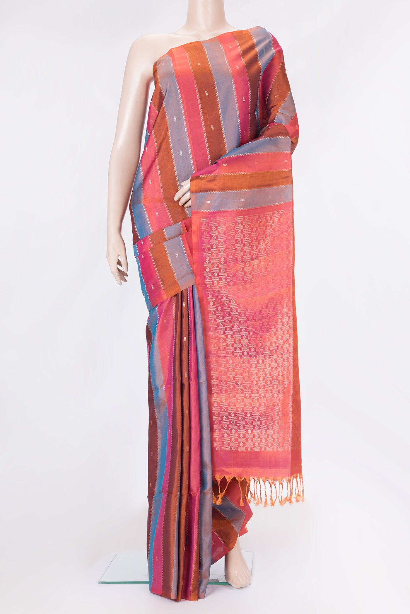 Pink, Brown and Peacock Blue Color Soft Silk Saree with Stripes on the body and Without Border.  displayed on a mannequin