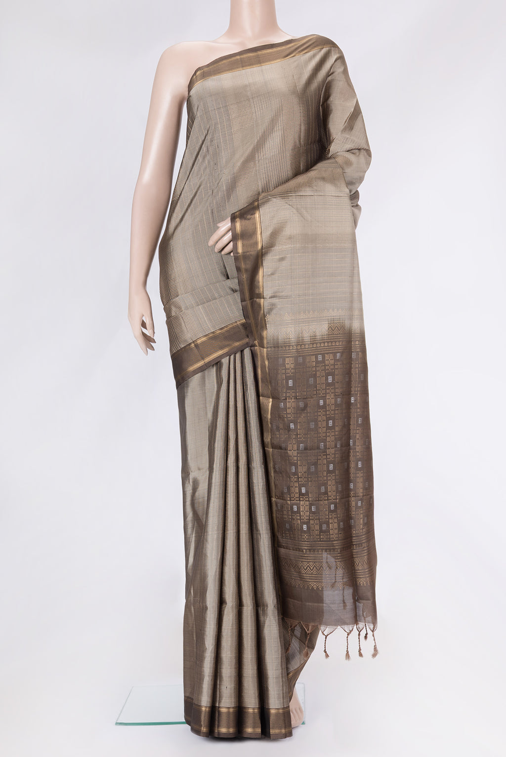 Grey Dual Tone Soft Silk Saree with Zari Butta on the body and Zari Border.  displayed on a mannequin