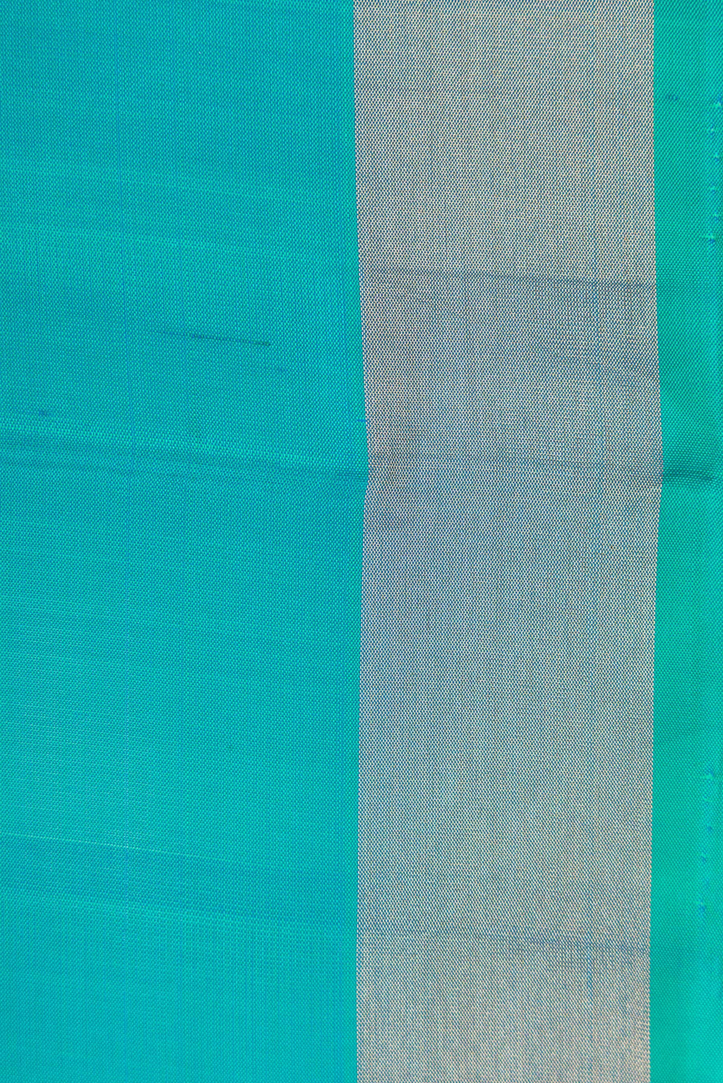 Border image of Sky Blue Dual Tone Soft Silk Saree with Zari Butta on the body and Zari Border. 