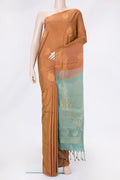 Gold Dual Tone Soft Silk Saree with Zari Butta on the body and Without Border.  displayed on a mannequin