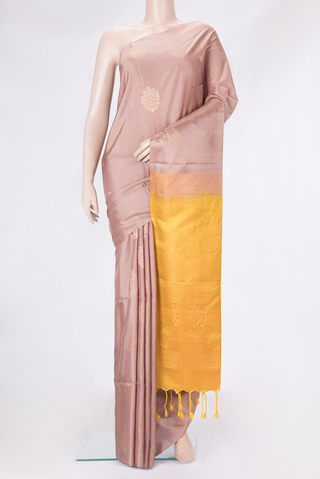 Rose Gold Dual Tone Soft Silk Saree with Zari Butta on the body and Without Border.  displayed on a mannequin
