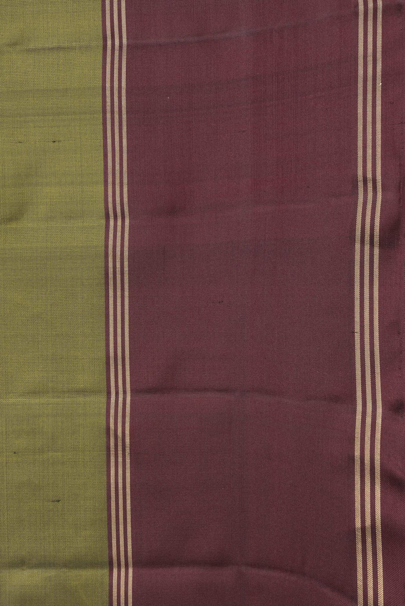 Border image of Mehandi Green Dual Tone Soft Silk Saree with Zari Butta on the body and Zari Border. 