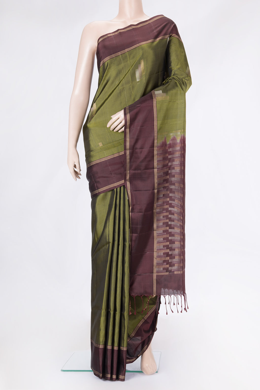 Mehandi Green Dual Tone Soft Silk Saree with Zari Butta on the body and Zari Border.  displayed on a mannequin