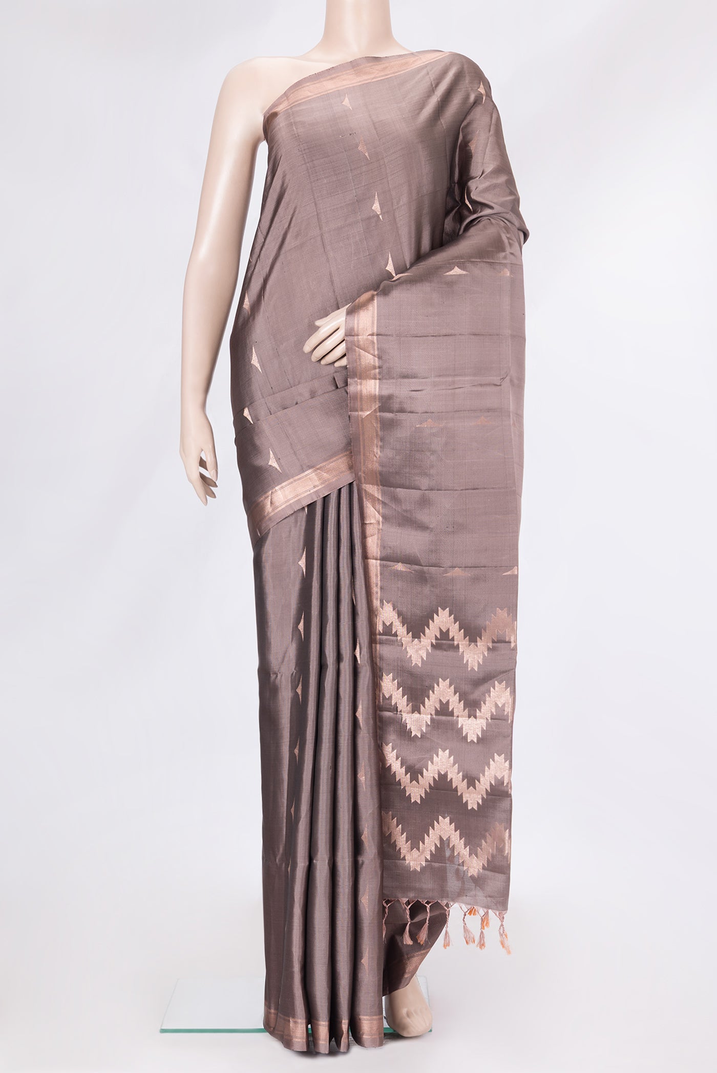 Brown Dual Tone Soft Silk Saree with Zari Butta on the body and Zari Border.  displayed on a mannequin