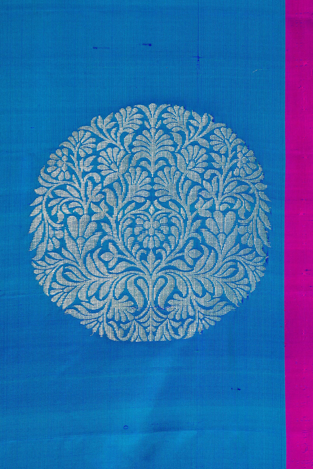 Border image of Peacock Blue Dual Tone Soft Silk Saree with Zari Butta on the body and Plain Border. 