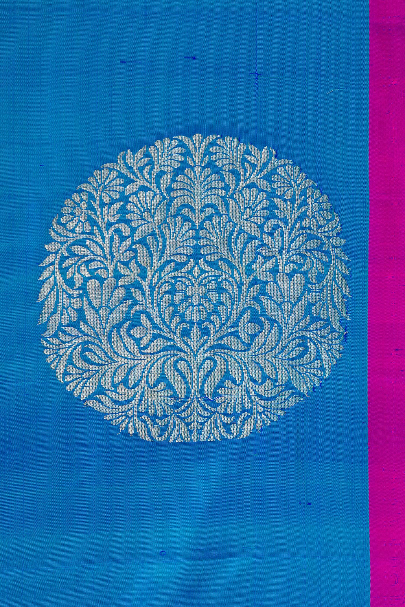 Border image of Peacock Blue Dual Tone Soft Silk Saree with Zari Butta on the body and Plain Border. 