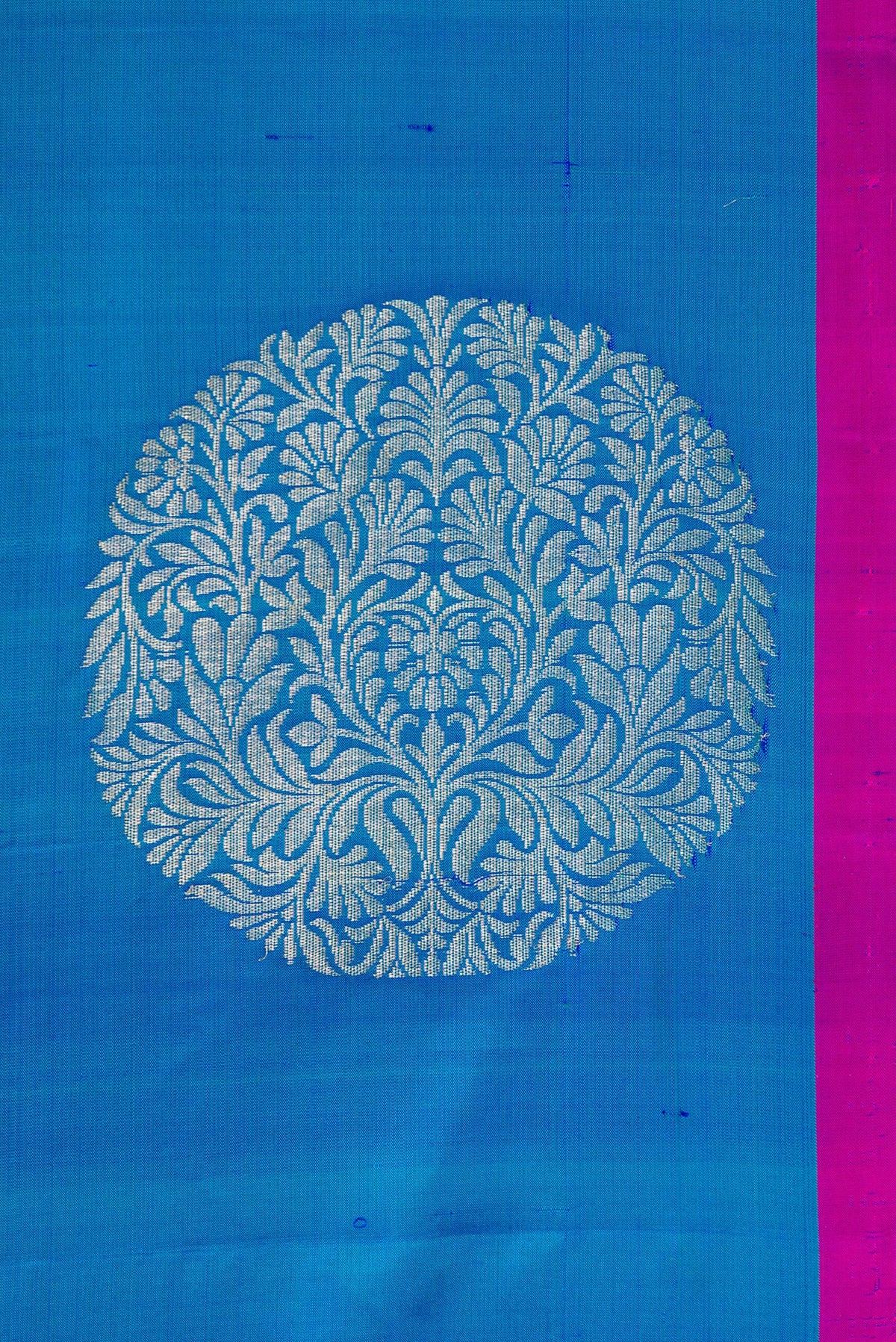 Border image of Peacock Blue Dual Tone Soft Silk Saree with Zari Butta on the body and Plain Border. 