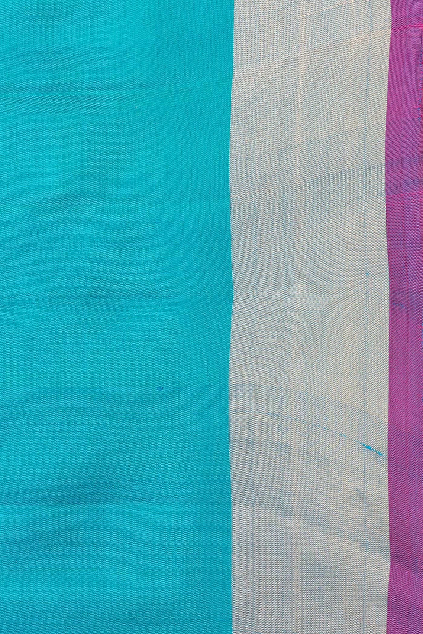 Border image of Sky Blue Dual Tone Soft Silk Saree with Zari Butta on the body and Zari Border. 