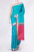 Sky Blue Dual Tone Soft Silk Saree with Zari Butta on the body and Zari Border.  displayed on a mannequin