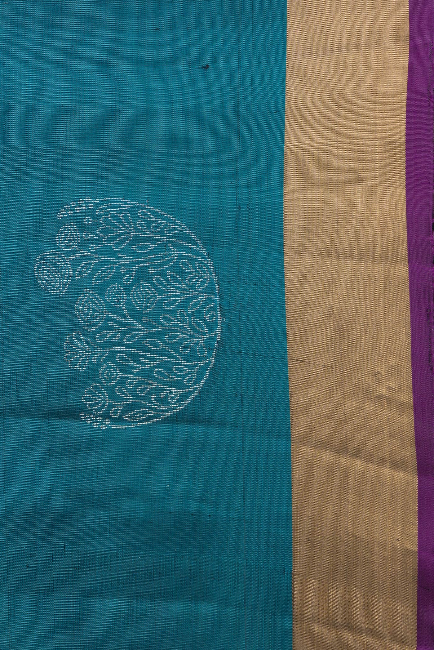 Border image of Peacock Blue Dual Tone Soft Silk Saree with Zari Butta on the body and Zari Border. 