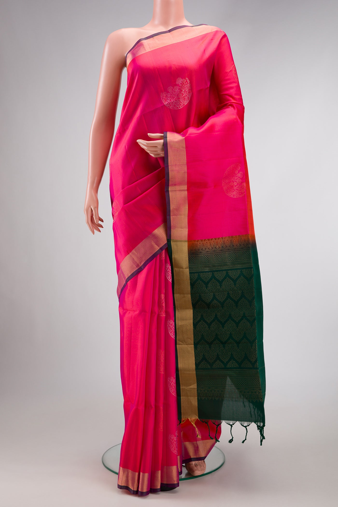 Pink Dual Tone Soft Silk Saree with Zari Butta on the body and Zari Border.  displayed on a mannequin