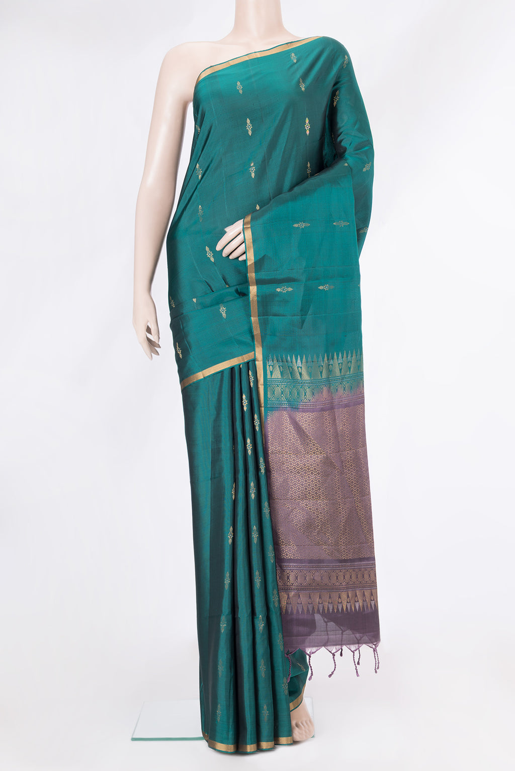 Bottle Green Dual Tone Soft Silk Saree with Zari Butta on the body and Zari Border.  displayed on a mannequin