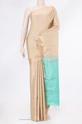 Beige Soft Silk Saree with Zari Butta on the body and Zari Border.  displayed on a mannequin