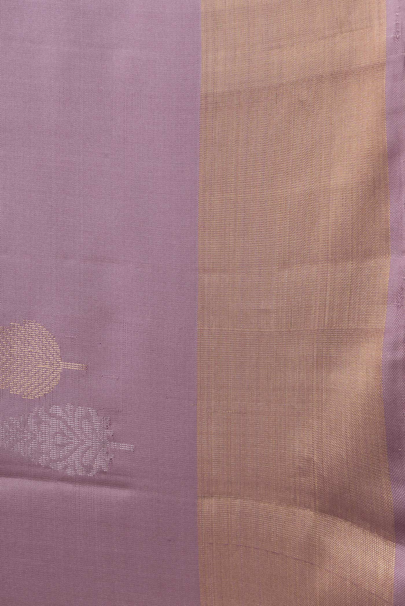Border image of Lavender Dual Tone Soft Silk Saree with Zari Butta on the body and Zari Border. 