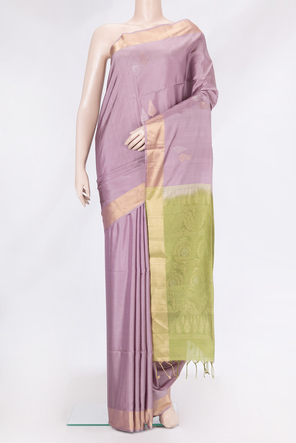 Lavender Dual Tone Soft Silk Saree with Zari Butta on the body and Zari Border.  displayed on a mannequin