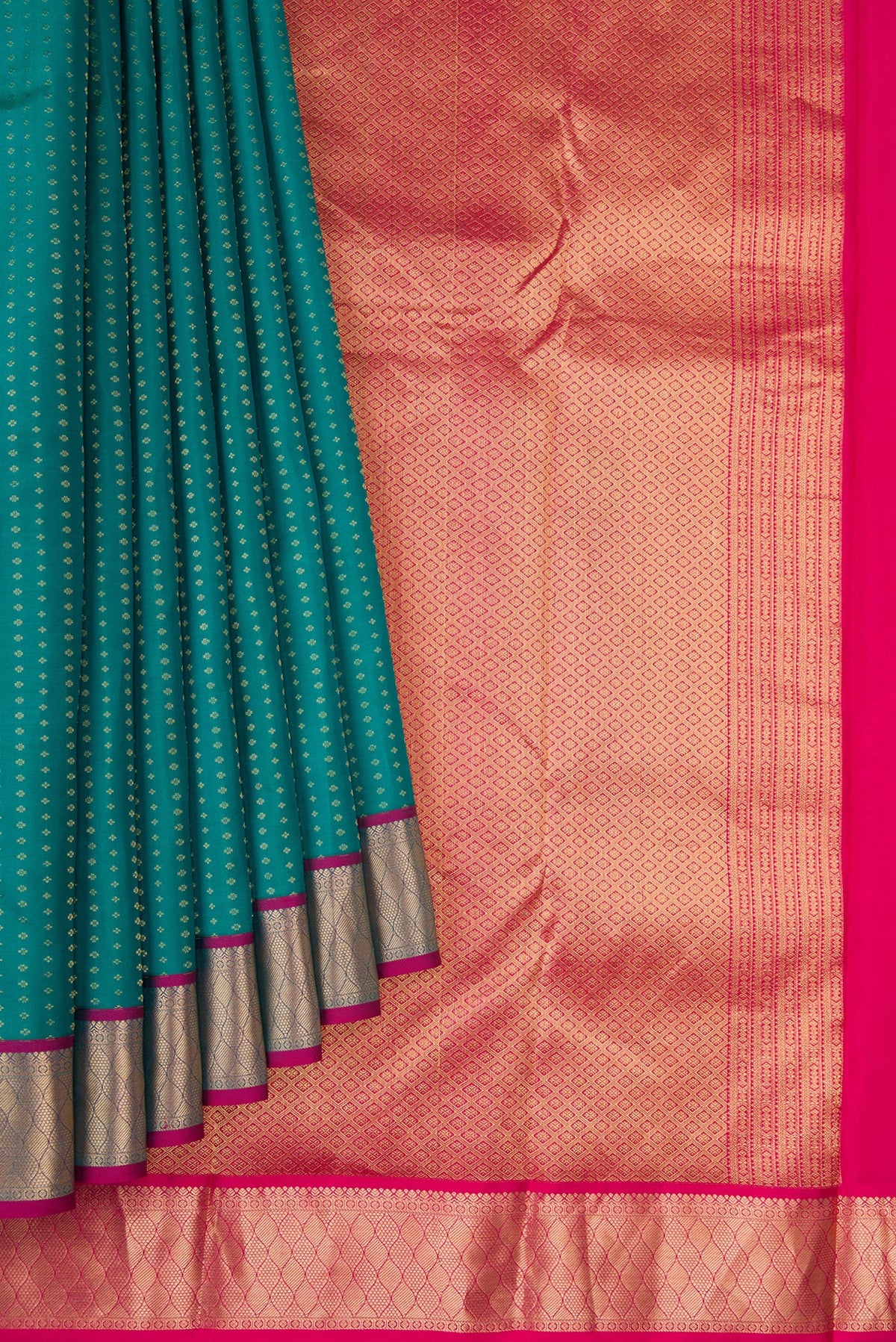 Pleats and pallu of Green Dual Tone Kanchipuram Silk Saree with Stripes on the body and Zari Border. 
