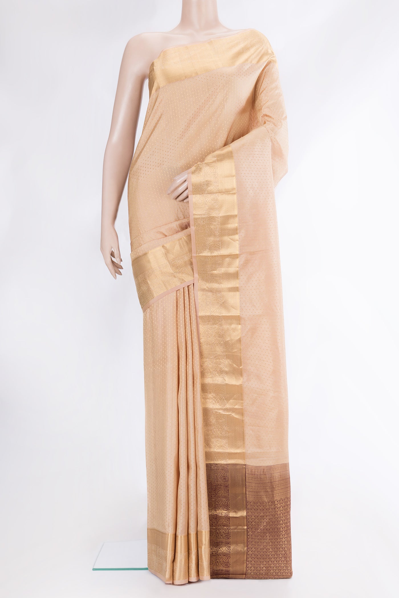 Caramel Dual Tone Kanchipuram Silk Saree with Zari Butta on the body and Zari Border.  displayed on a mannequin