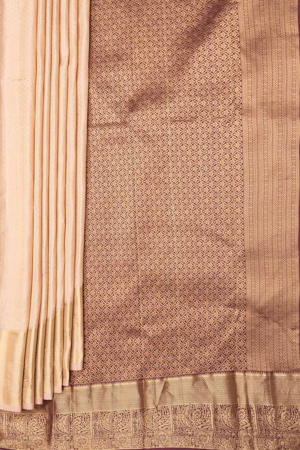 Pleats and pallu of Caramel Dual Tone Kanchipuram Silk Saree with Zari Butta on the body and Zari Border. 