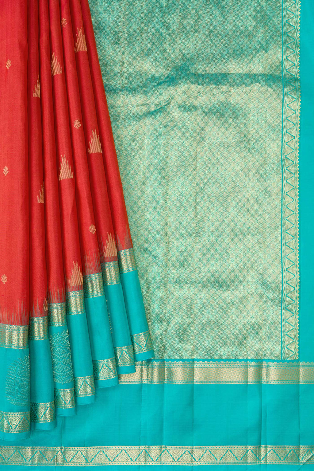 Pleats and pallu of Brick Orange Dual Tone Kanjivaram Silk Saree with Zari Butta on the body and Fancy Border. 