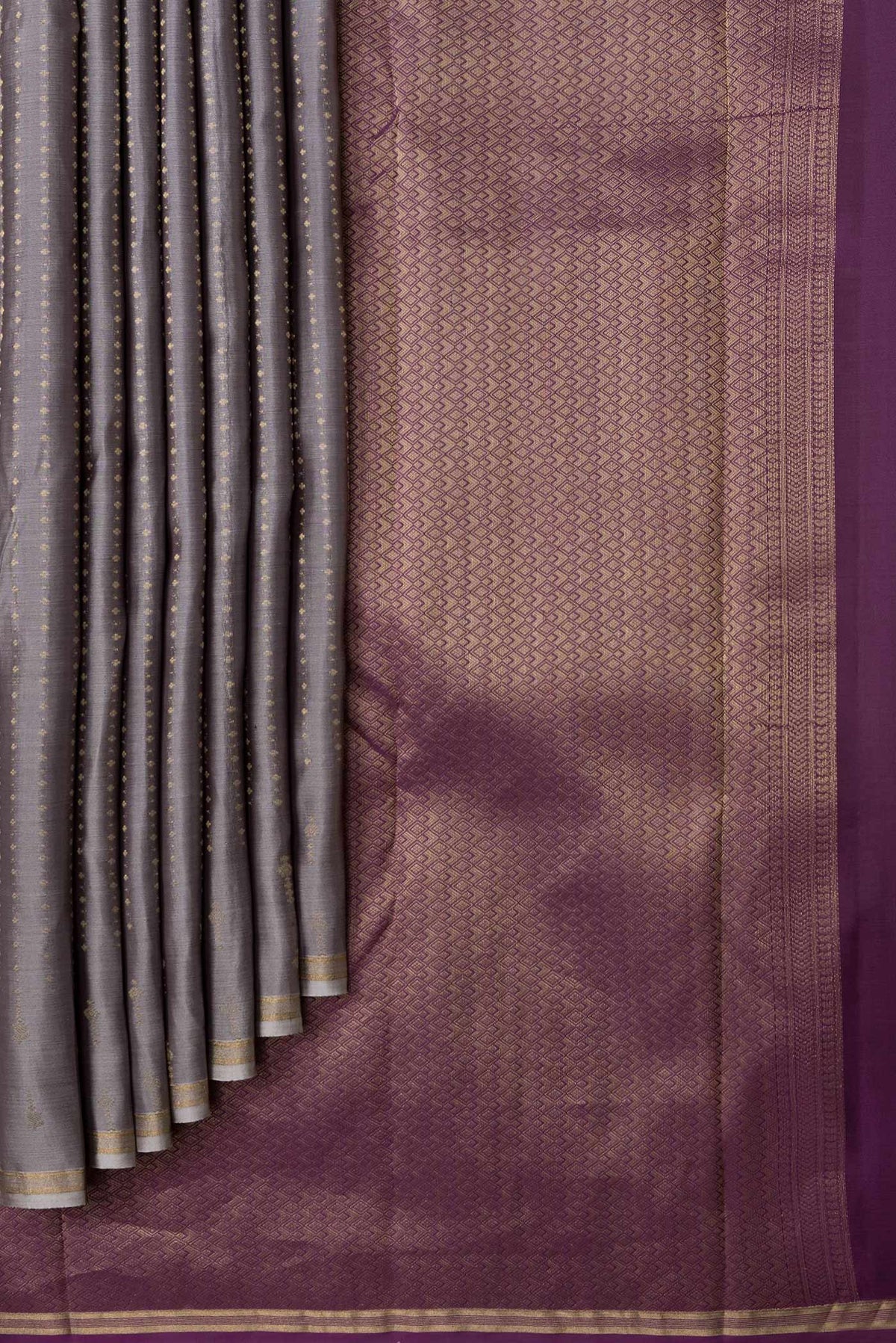 Pleats and pallu of Grey Dual Tone Kanchipuram Silk Saree with Zari Butta on the body and Zari Border. 